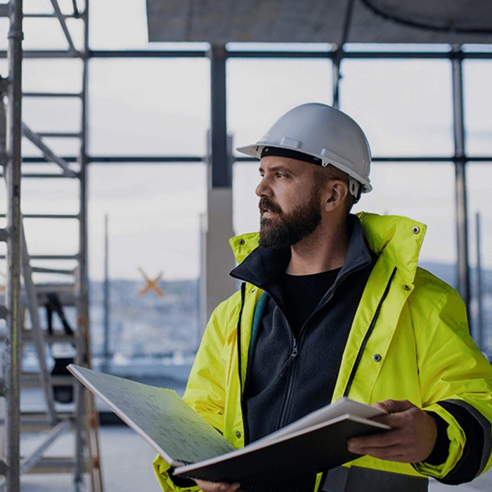 image of an engineer planning on a jobsite